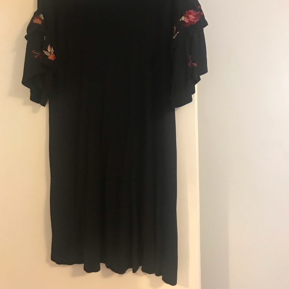 Little black dress with detailed sleeves